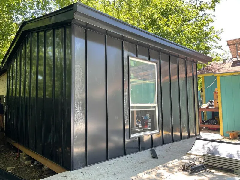 Black standing seam metal wall panels for Roof Inspection in Kermit